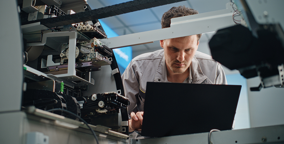 Service Technician making repairs to hardware