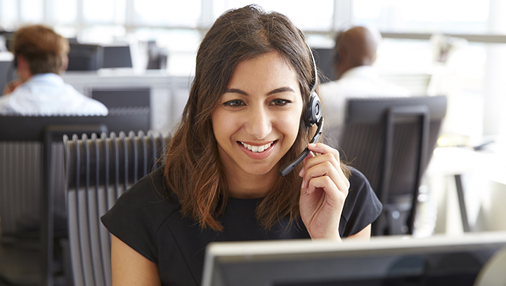 customer service rep on a call with a customer