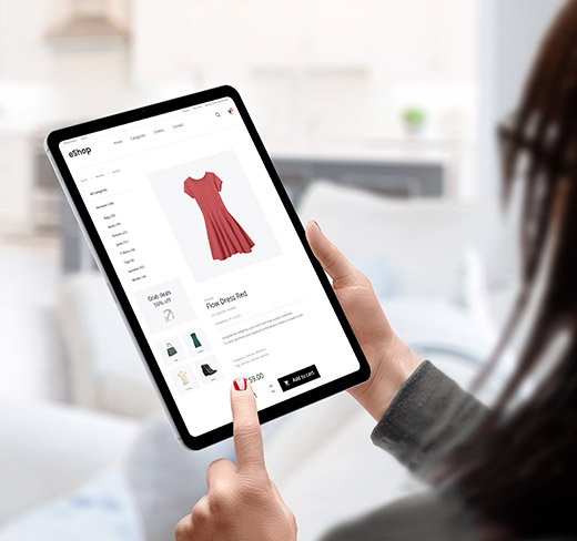 woman shopping on tablet