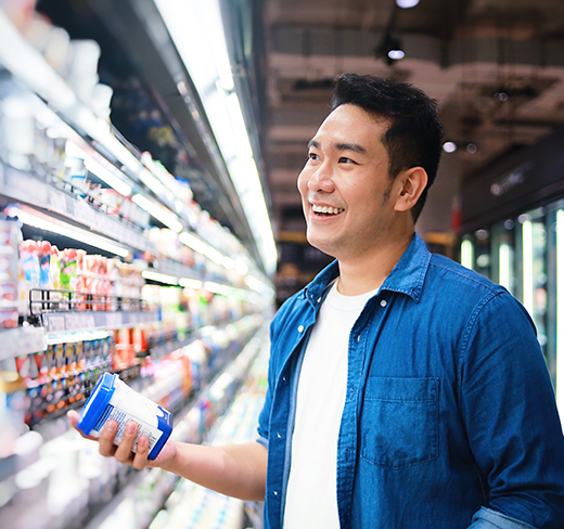 man browsing in a grocery store