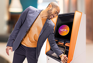 Man using ATM